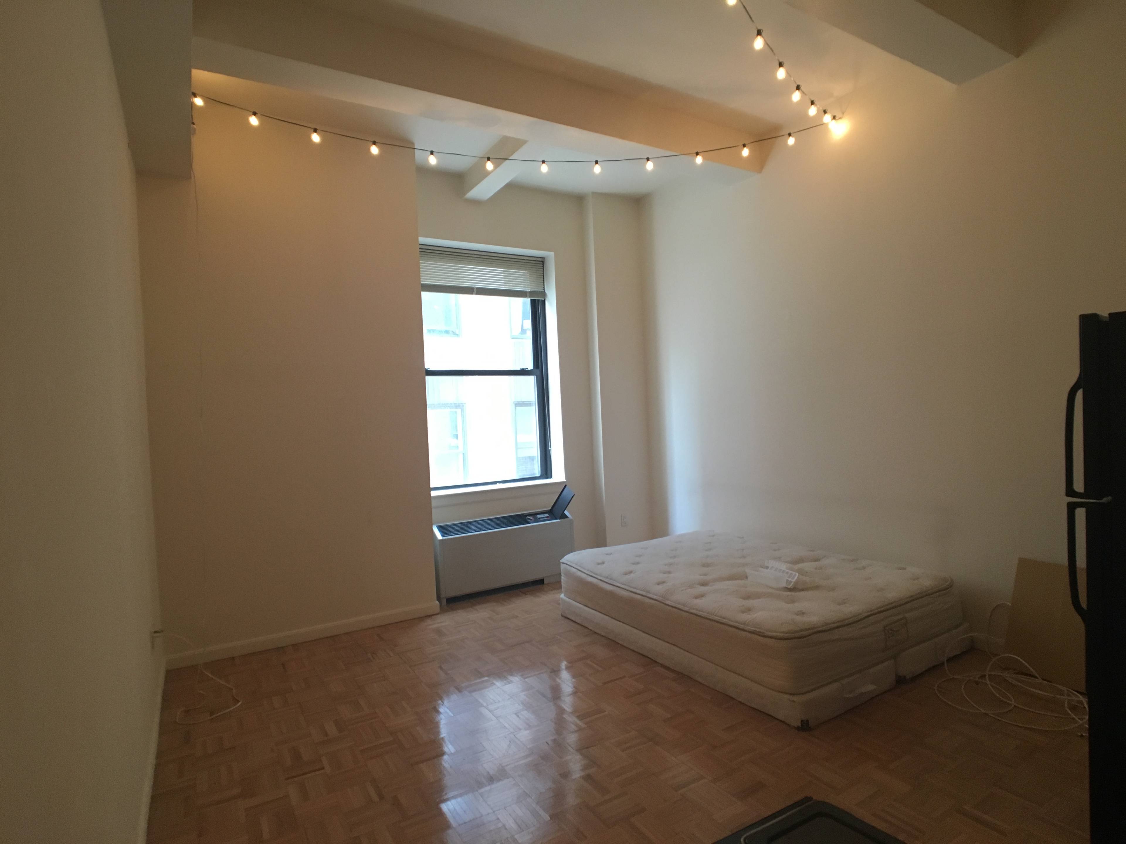 *no fee* Spacious studio with home office space in Seaport District! Full time doorman building