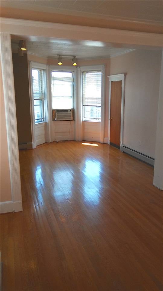 **GREAT DEAL IN RED HOT JERSEY CITY HEIGHTS ** EXTRA LARGE TWO BEDROOM WITH DEN AND INCLUDES PARKING