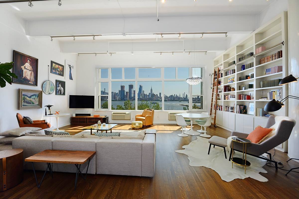 Expansive renovated loft in the Hudson Tea Building with dazzling unobstructed NYC views