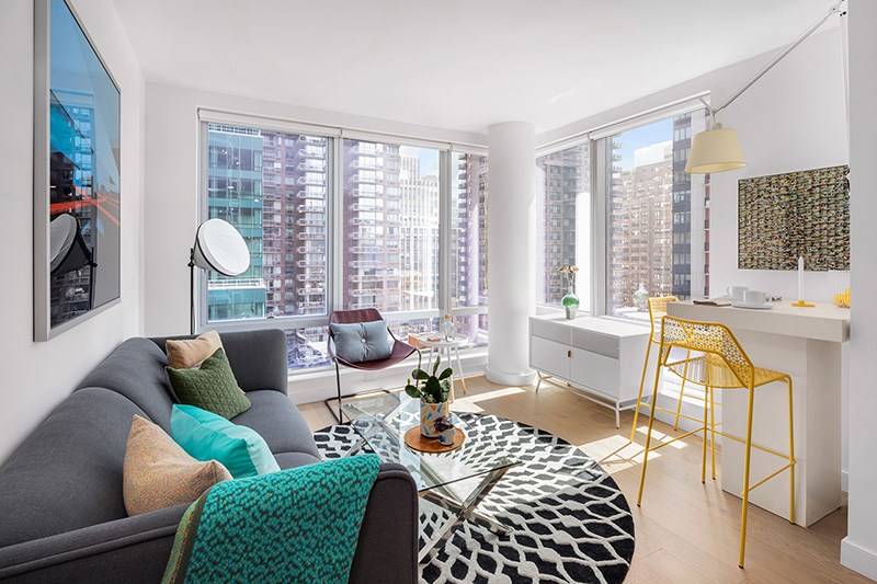 2 Months Free Rent!!!  Limited Time Only!!!   Marvelous Midtown East 2 Bedroom Apartment with 2 Baths featuring a Swimming Pool and Rooftop Deck