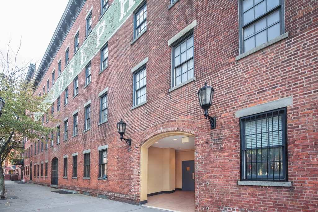 This outstanding & spacious studio with alcove is located in the much desired Dixon Mills community in downtown Jersey City