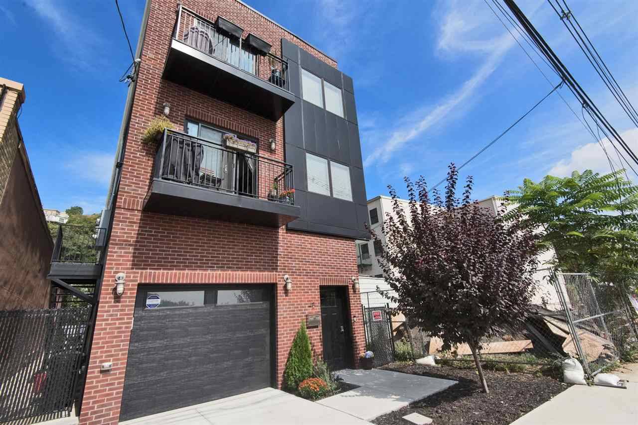 Contemporary Newer 2 Family built in 2015 with views of Freedom Tower