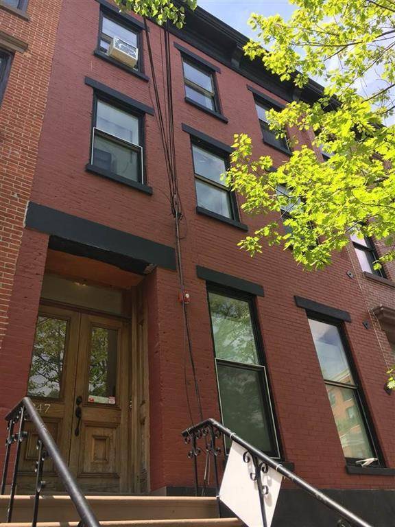 Renovated One Bedroom on Downtown Jersey City’s Lively Grove St Strip