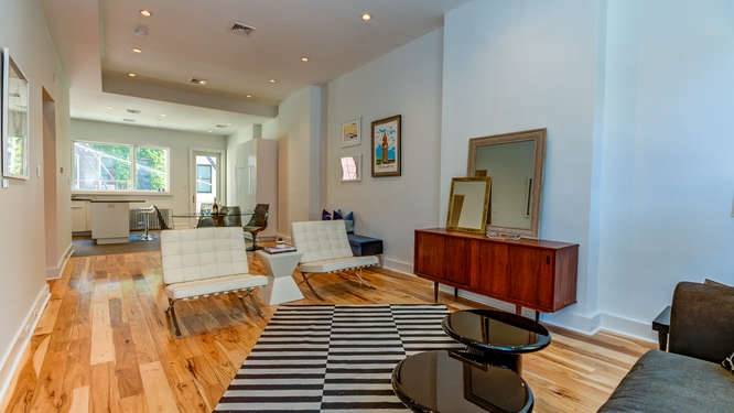 Come see a rarity: a 20-foot wide uptown home that beautifully blends the contemporary and the traditional