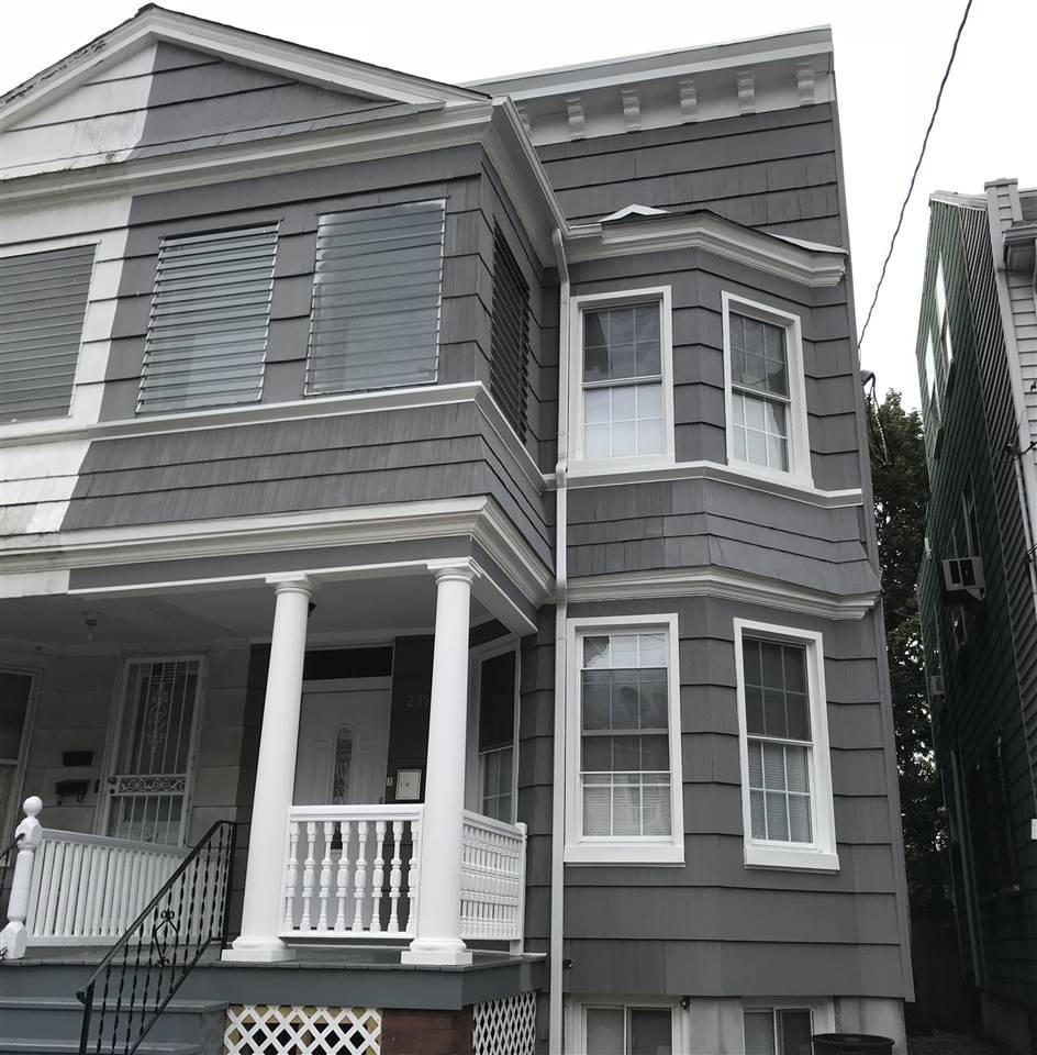 Completely renovated semi-attached 2 family with parking in Journal Square