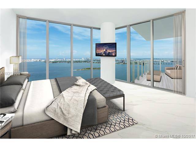 Stunning views from this high-floor SE 3BR+ Den corner unit in the newest and most luxurious building in Edgewater