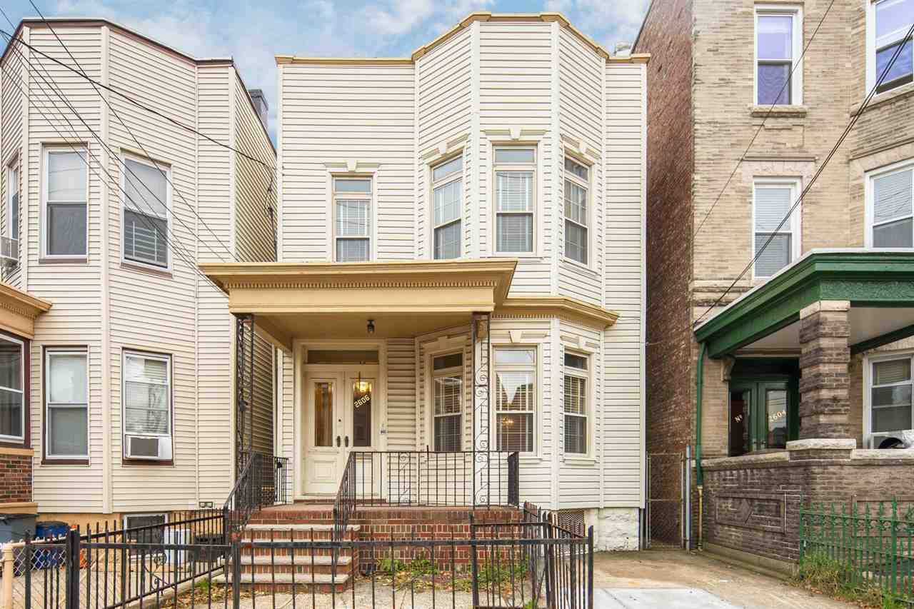 Charming Victorian two family home with parking in the heart of Weehawken