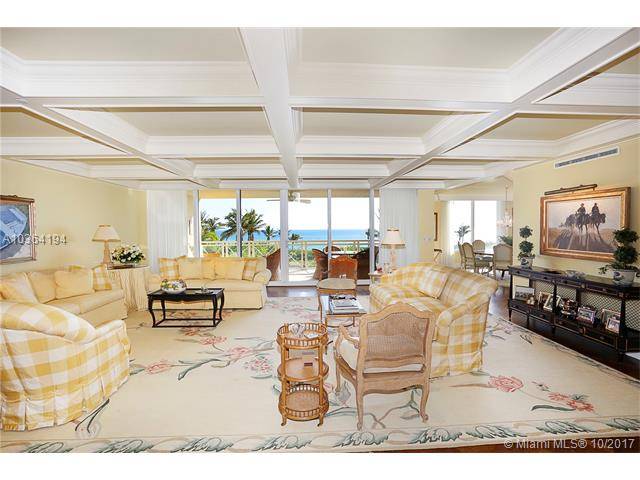 Crown jewel of Grand Bay exquisite decorator finished with top of the line oceanfront corner location facing directly east with stunning views
