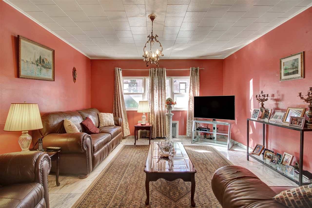 Lovingly cared for West New York Two-Family has been owned by the same family for over 30 years