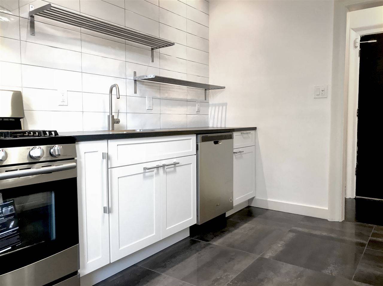 Updated 1 BR rental including heat and hot water with easy access to NYC bus