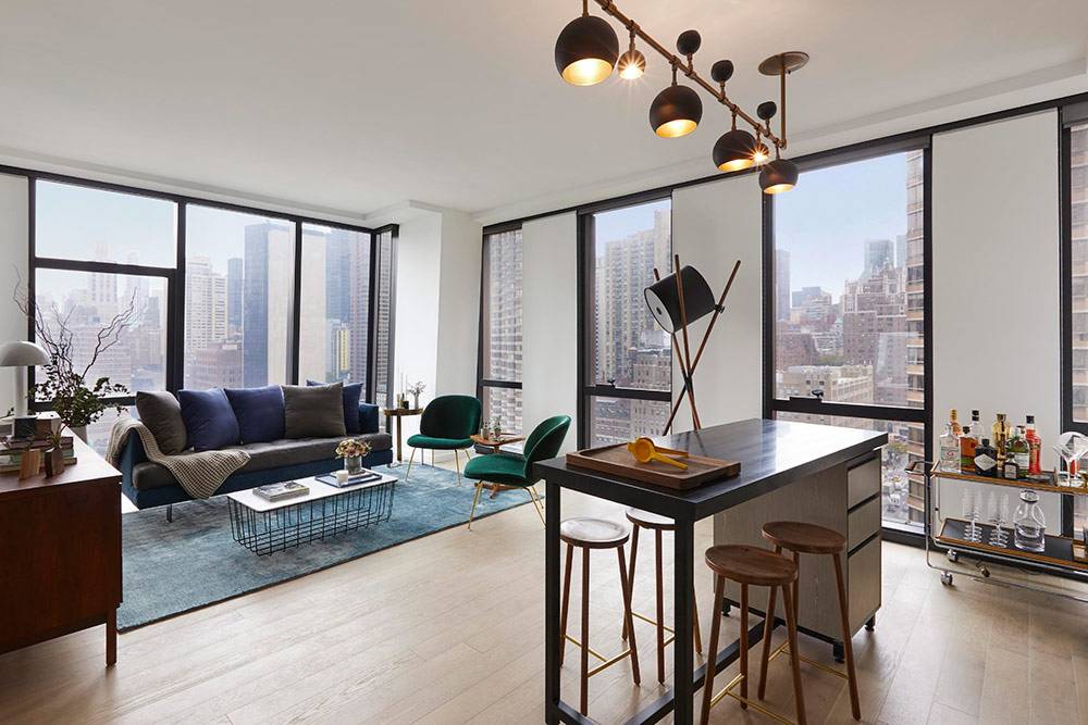 No Broker Fee + 1 Month Free Rent!!!   Limited Time Only!!!    Modern Midtown East 1 Bedroom Apartment with 1 Bath featuring a Swimming Pool and Rooftop Deck