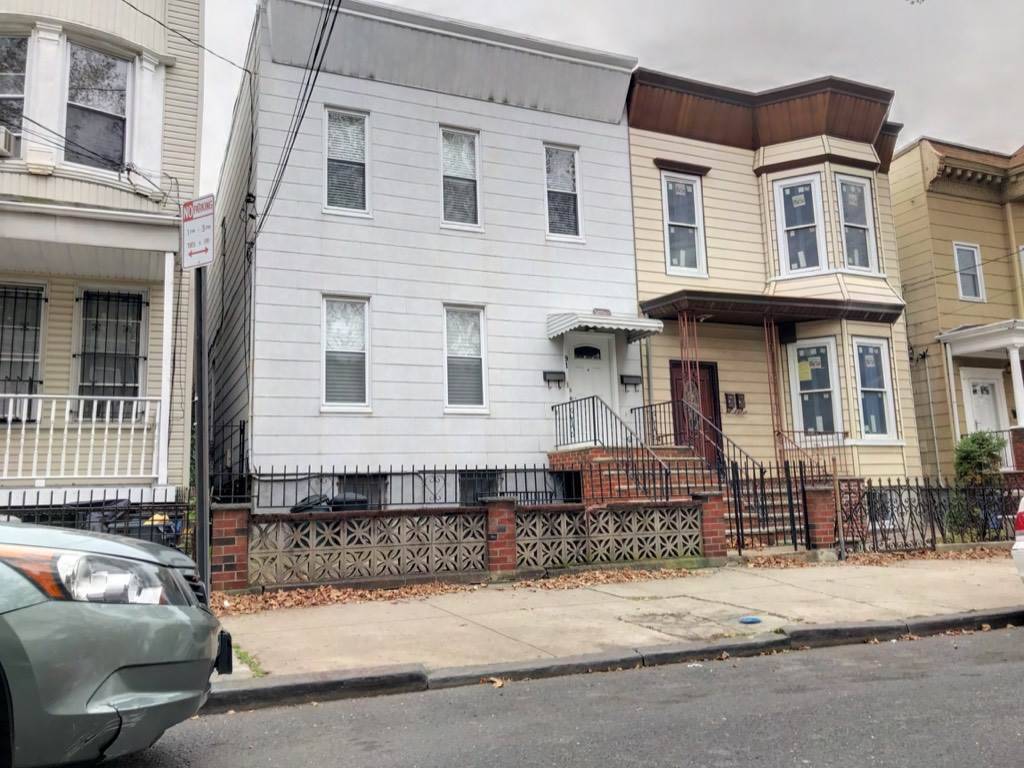 Located on one of the most charming blocks in the Jersey City Heights this solid two family residence has all the makings of a great property