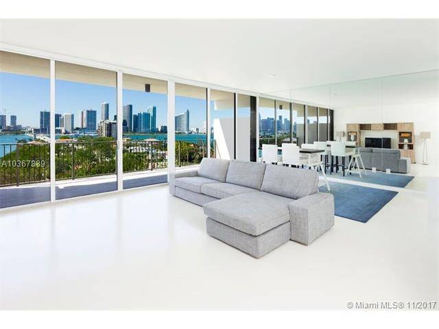 Unique two story unit with amazing water and skyline views form every angle