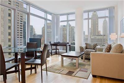 Furnished 1 Bedroom Corner apartment at The Centria Condo - Full service luxury doorman in the heart of Midtown