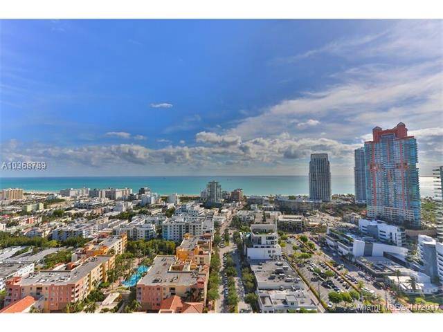 This highly desirable 29th floor condo boasts panoramic ocean views and top notch amenities