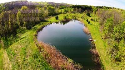 Custom Built 21 Acres Pond Side Property for Sale in Cooperstown, NY