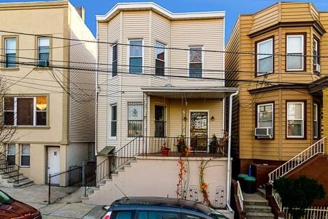 Minimize your living expenses with this renovated Single Family Row House with a detached 2nd unit Rental apartment in the rear