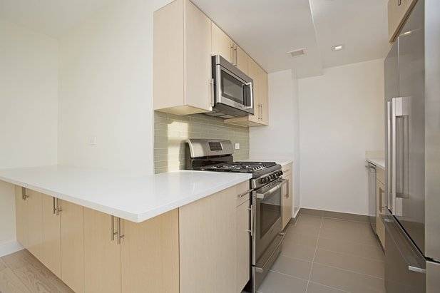 No Broker Fee + 1 Month Free Rent!!!    Limited Time Only!!!     Charming West Village 2 Bedroom Apartment with 2 Baths Featuring a Roof Deck & Gym