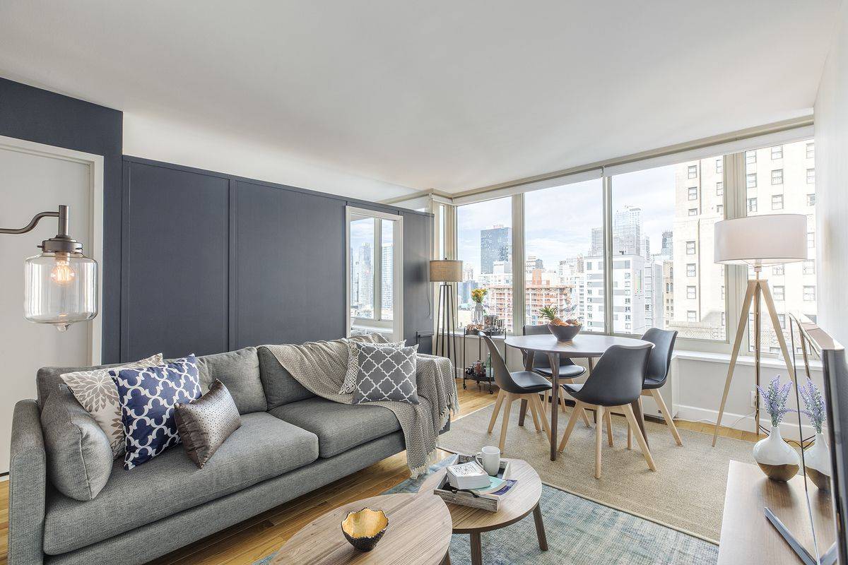 No Broker Fee + 2 Months Free Rent!!!   Limited Time Only!!!    Elegant Hell's Kitchen 2 Bedroom Apartment with 2 Baths featuring a Rooftop Deck and Fitness Facility