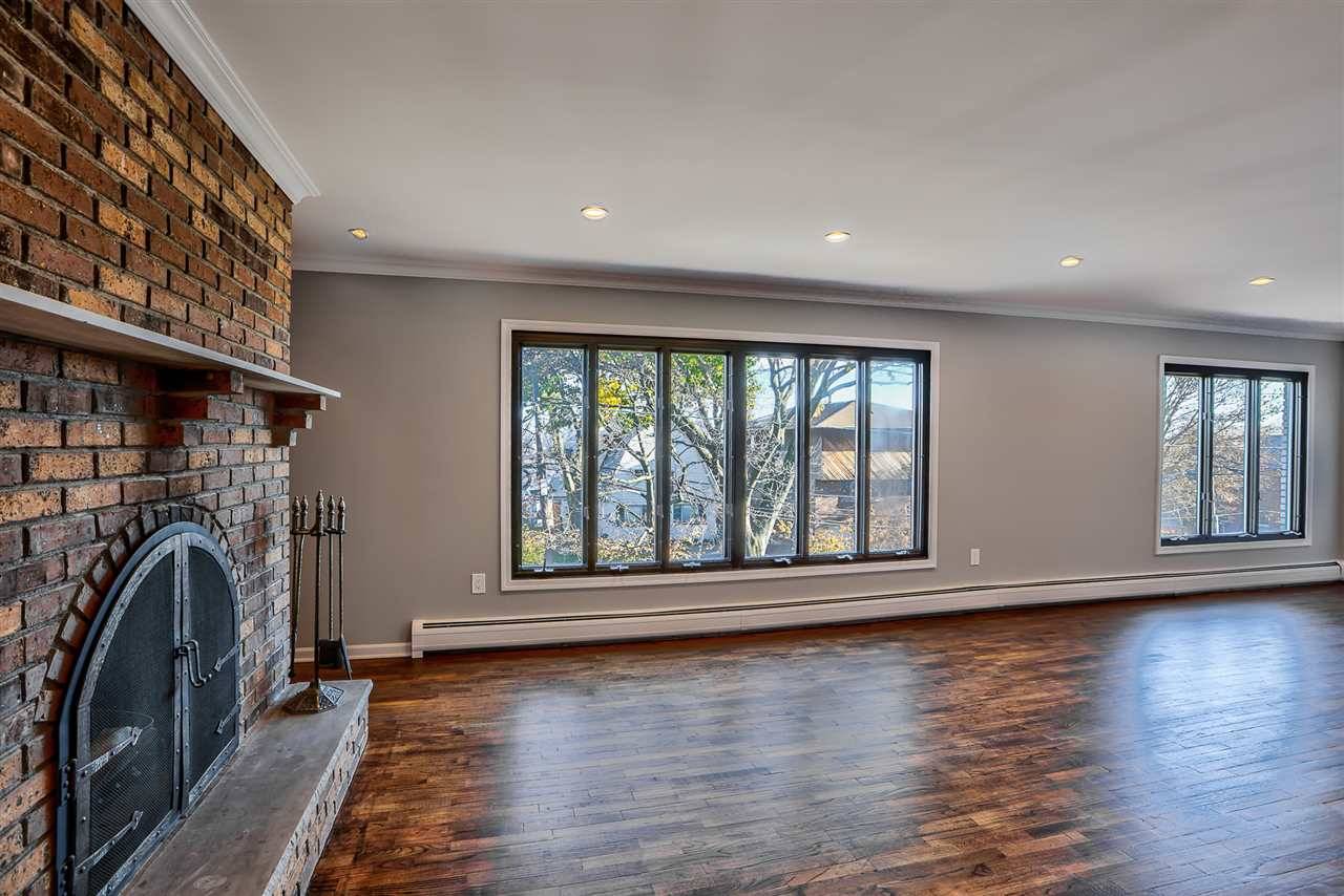 Sprawling 3 BD/2 full BA apartment with partial NYC views and parking included in the Kings Bluff section of Weehawken