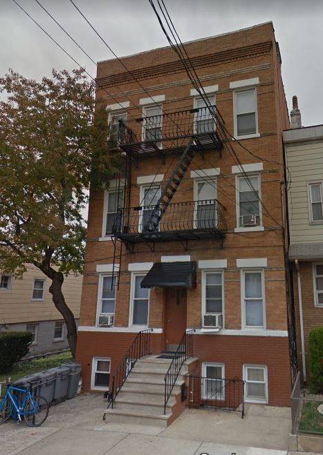 3 story 7 residential unit brick building in the heights section of Jersey City
