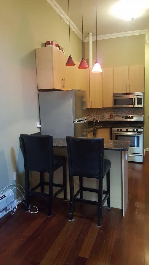 Check out this great condo in a fantastic mid-town Hoboken location