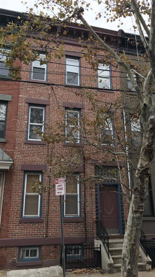 Prime investment opportunity to own a solid brick 3 Family in downtown Jersey City