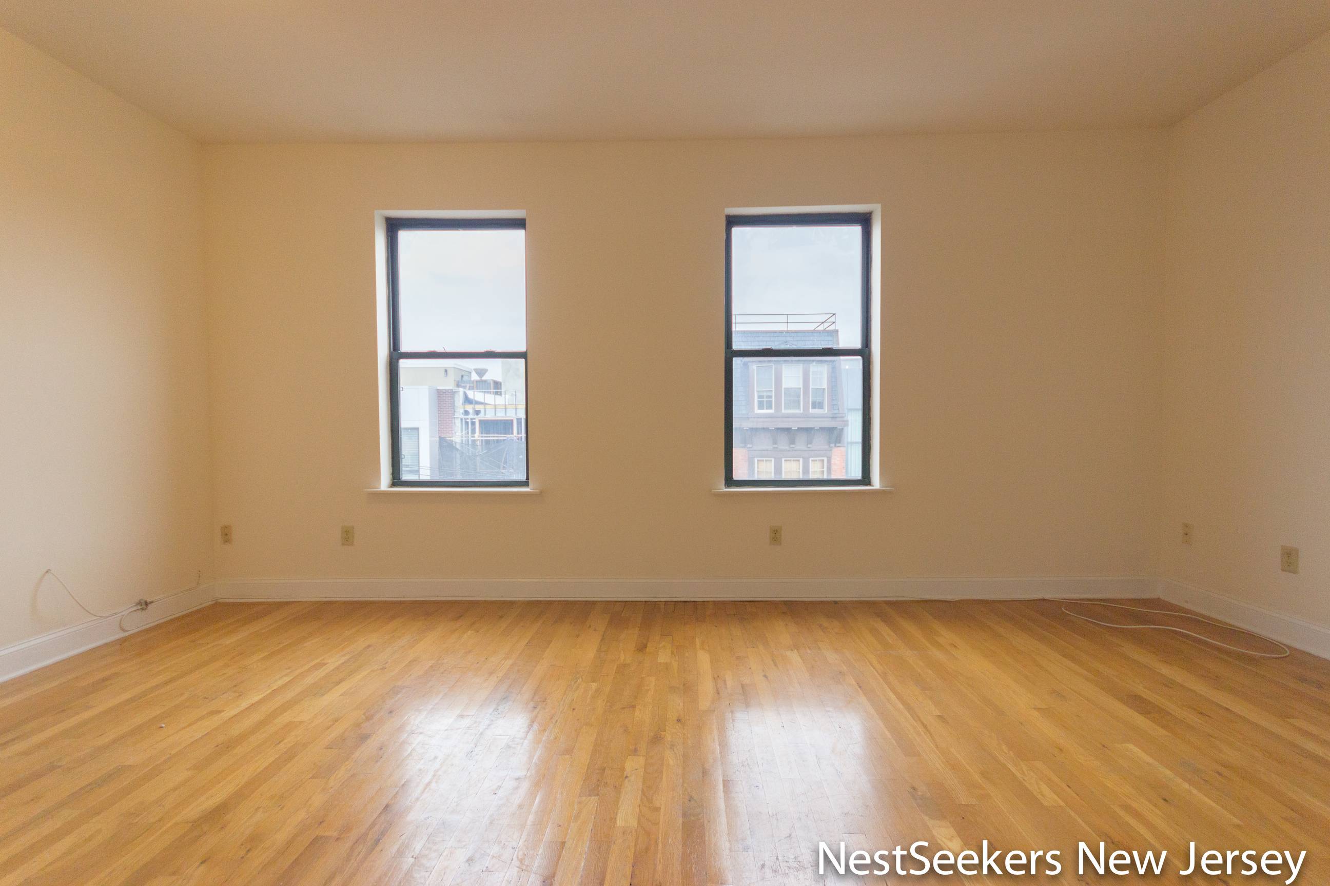 Huge 2BR/1BA Unit in Downtown Hoboken!  East Facing, No Fee! Laundry, Elevator, Gym and Parking on Site!