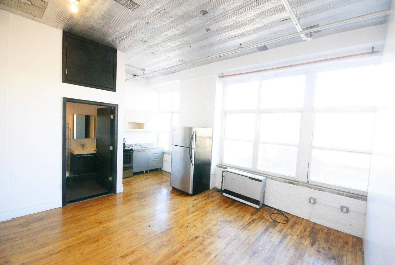 Stunning Bushwick NO FEE Loft with Spacious Living Room and High Ceilings
