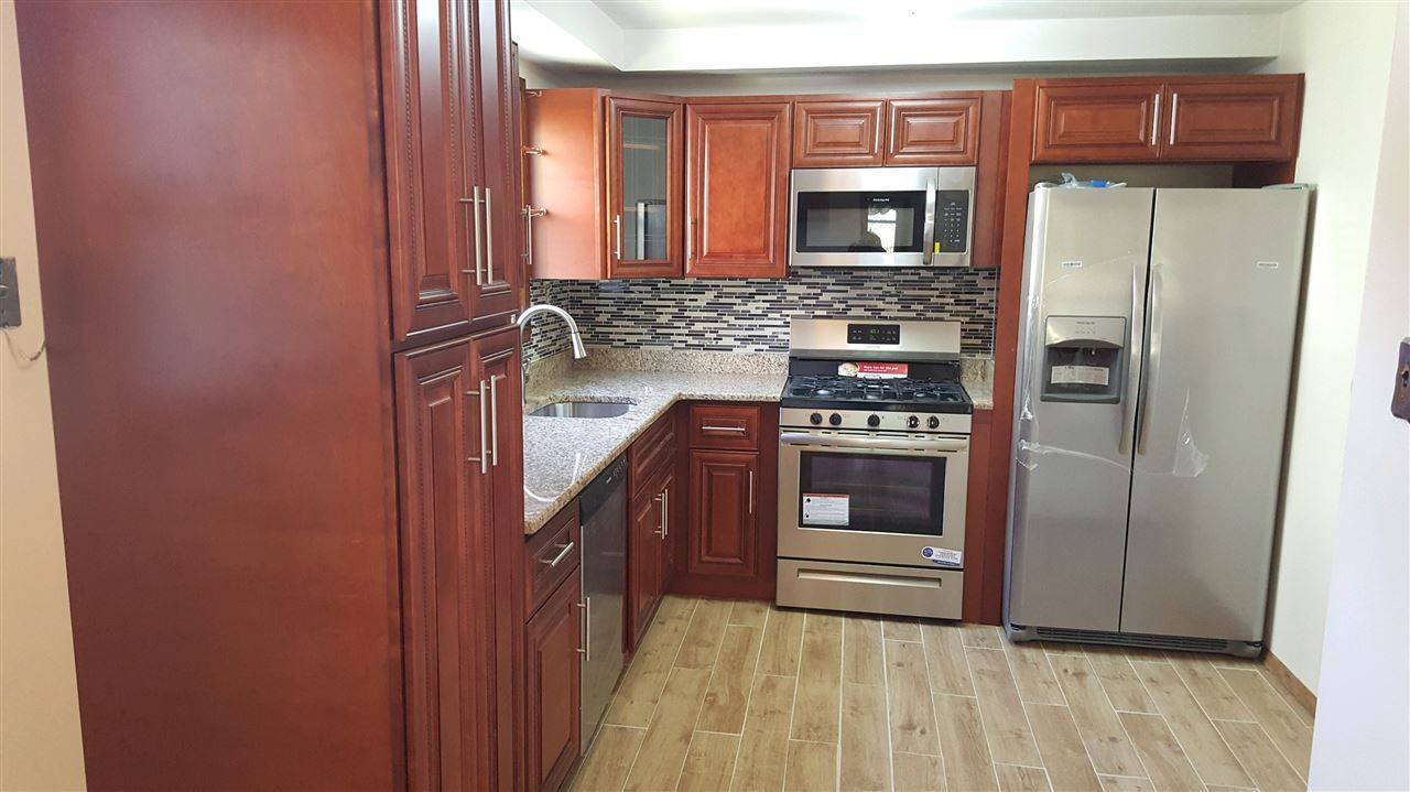 Legal 3 Bedrooms 3 Baths in private two family home in Jersey City Heights