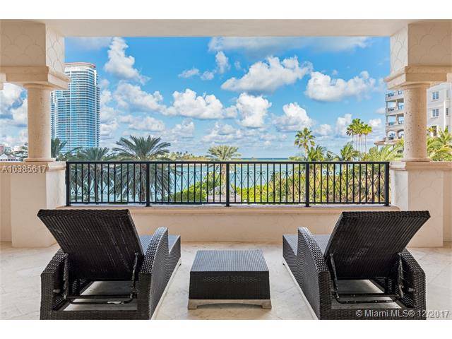 Indulge your self in this one of a kind waterfront property on exclusive Fisher Island
