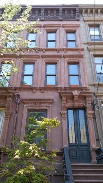 Beautifully renovated duplex condo in historic Brownstone w 12 ft ceiling on parlor level; bright and spacious space