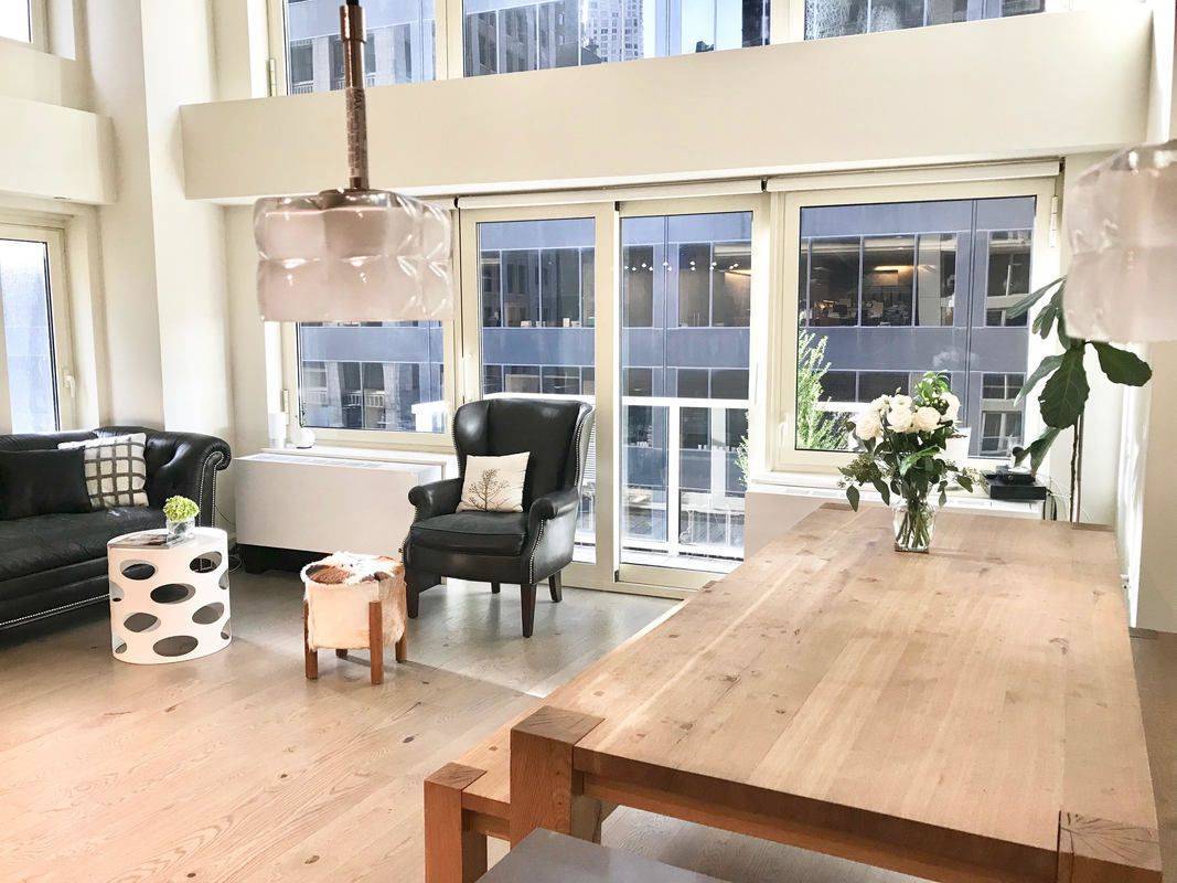 Fantastic Financial District 3 Bedroom Duplex Apartment with 2 Baths featuring 2 Balconies and a Rooftop Deck
