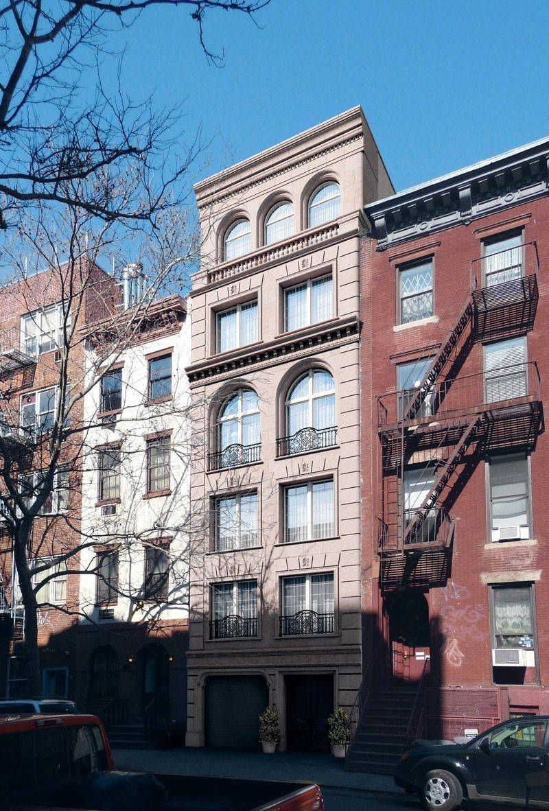 Gorgeous East Village Townhouse with two stunning residences. Call 212-729-4181