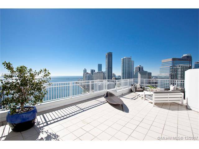 Incredible and unique corner penthouse located on the quiet island oasis of Brickell Key