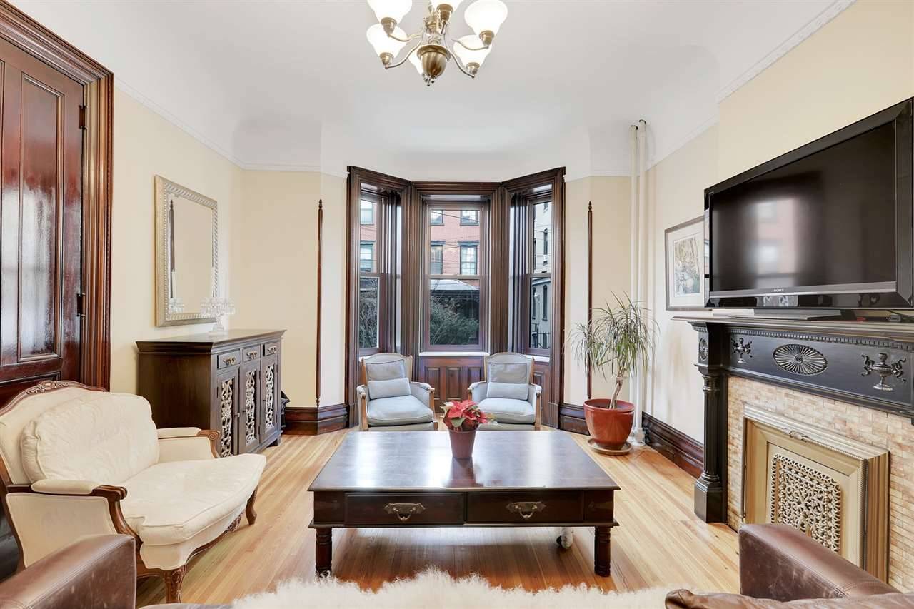 Elegance abounds in this remarkable parlor level brownstone home