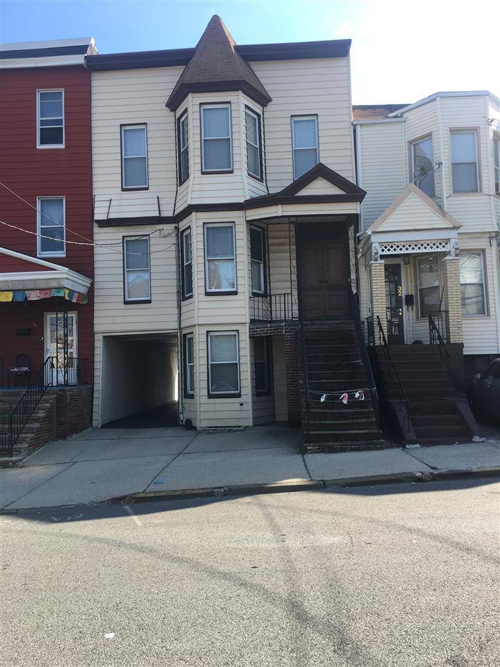 JOURNAL SQUARE--- ATTENTION---INVESTORS/ DEVELOPERS/ 2 FAMILY+ 5 GARAGES AND 2 PARKING SPACES