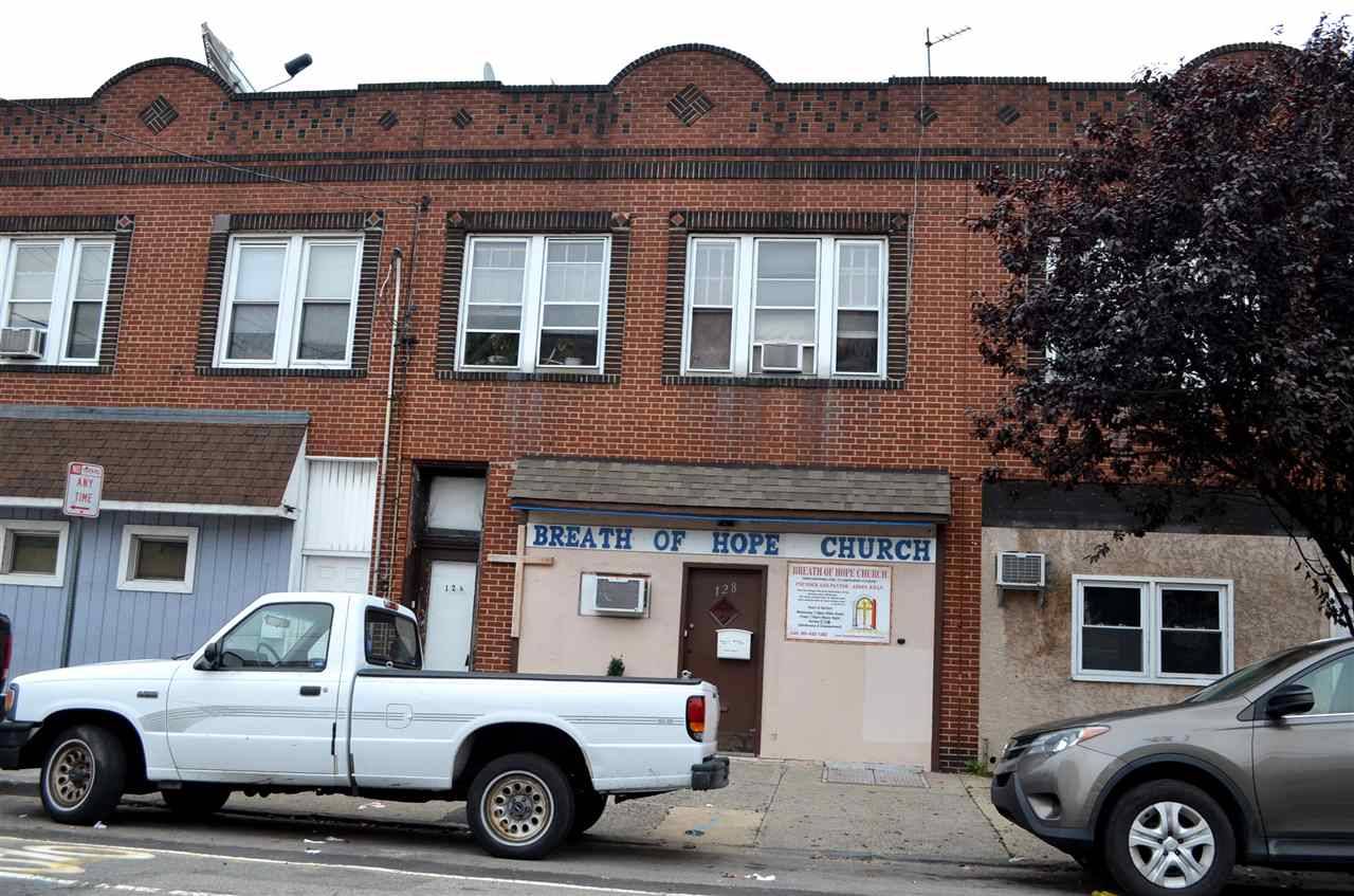 Mixed use property with commercial space & positive rental income