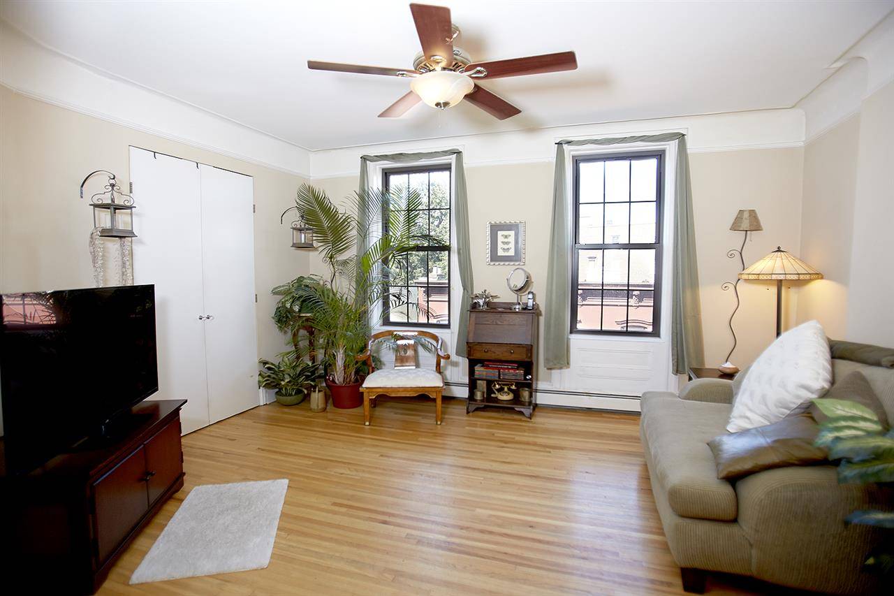 Welcome to this 2-bedroom plus office/dining room in an amazing uptown Hoboken location