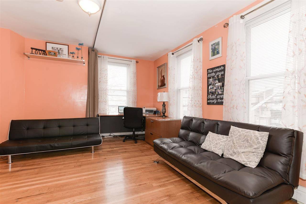 Spacious 3 Bed/2 Bath Condo with parking in the Heart of Jersey City Heights