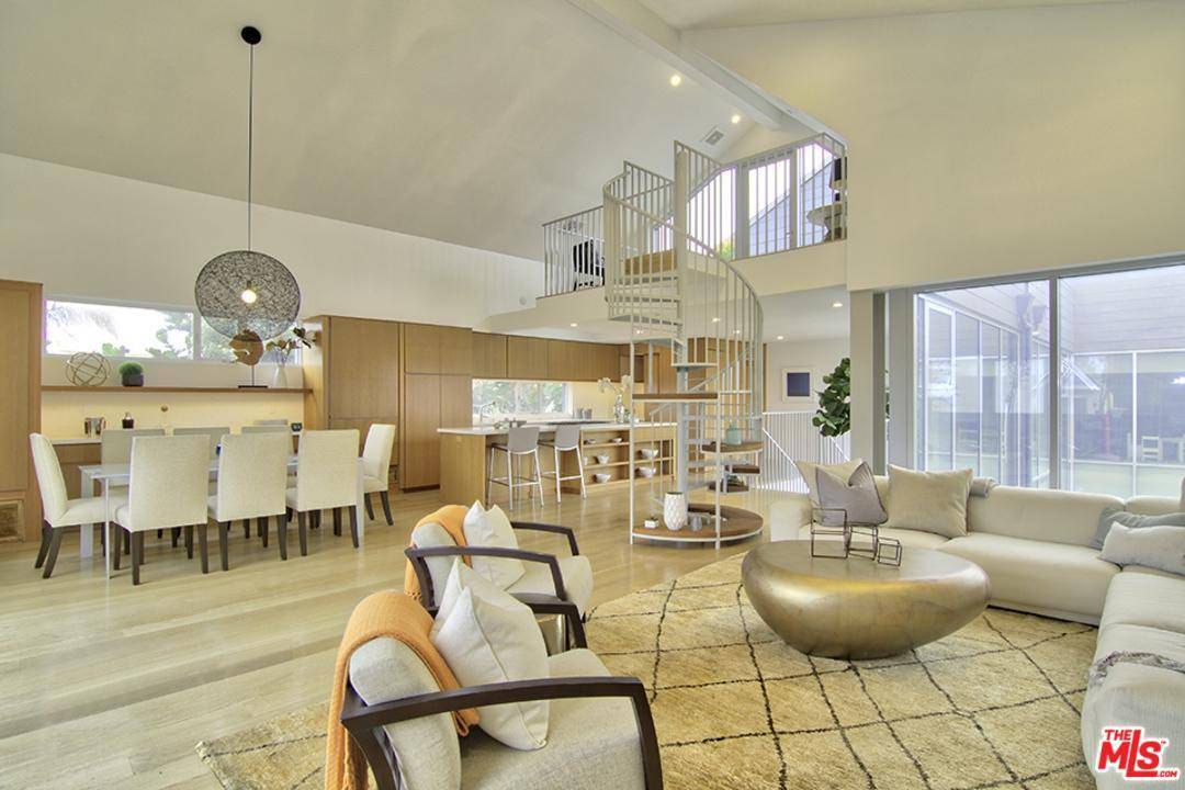 Light and bright modern architectural townhome just four blocks to the beach