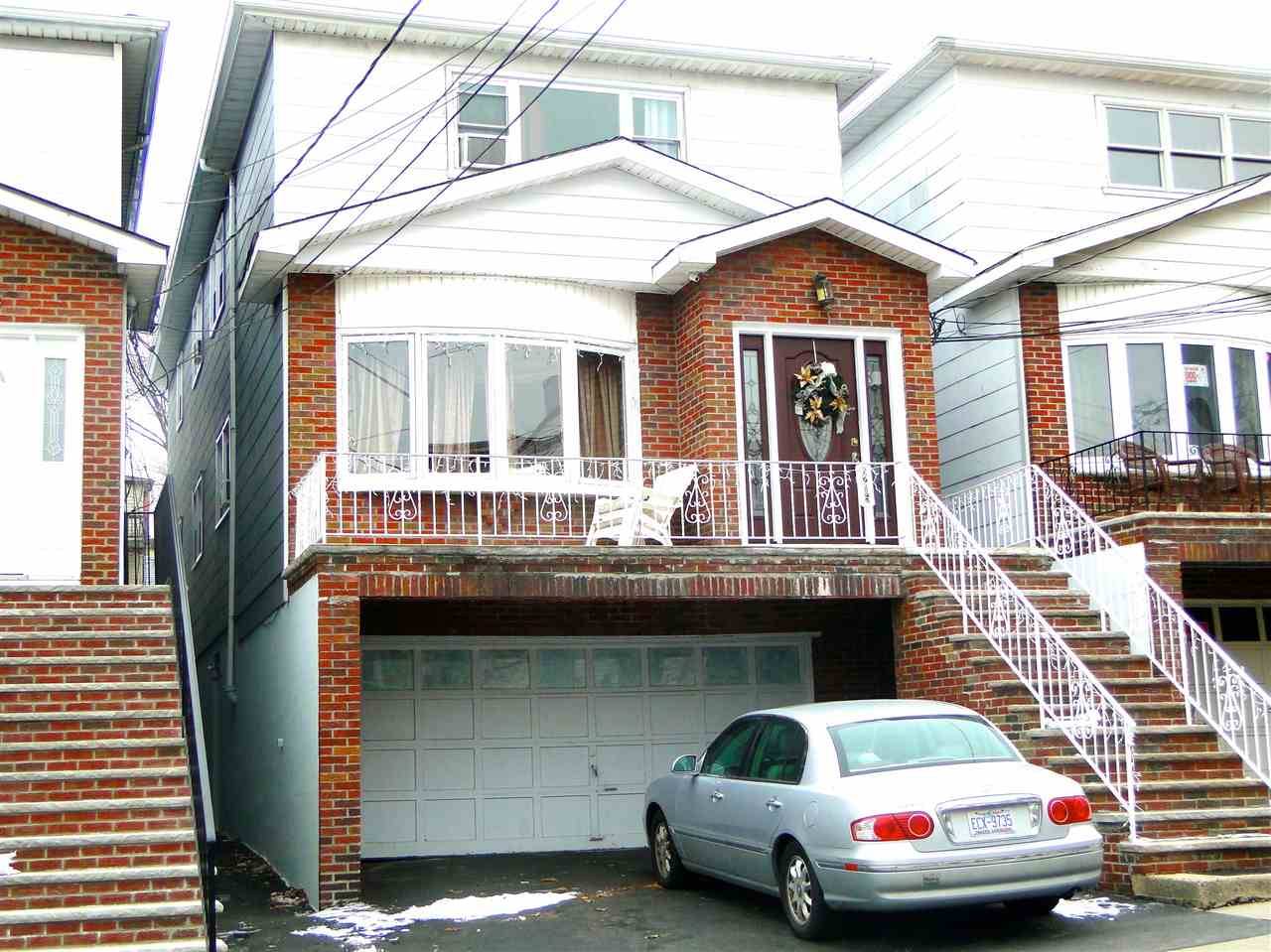 This beautiful well maintained 3 family home is located at 6215 Polk Street in West New York