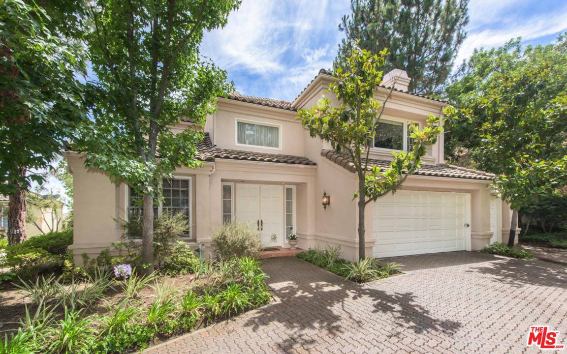 Located within the exclusive guard gated community of Bel-Air Crest