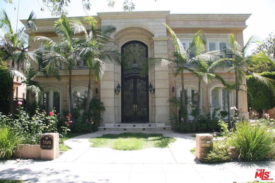 GORGEOUS MEDITERRANEAN HOME COMPLETED IN 2005 ON A LARGE CORNER LOT