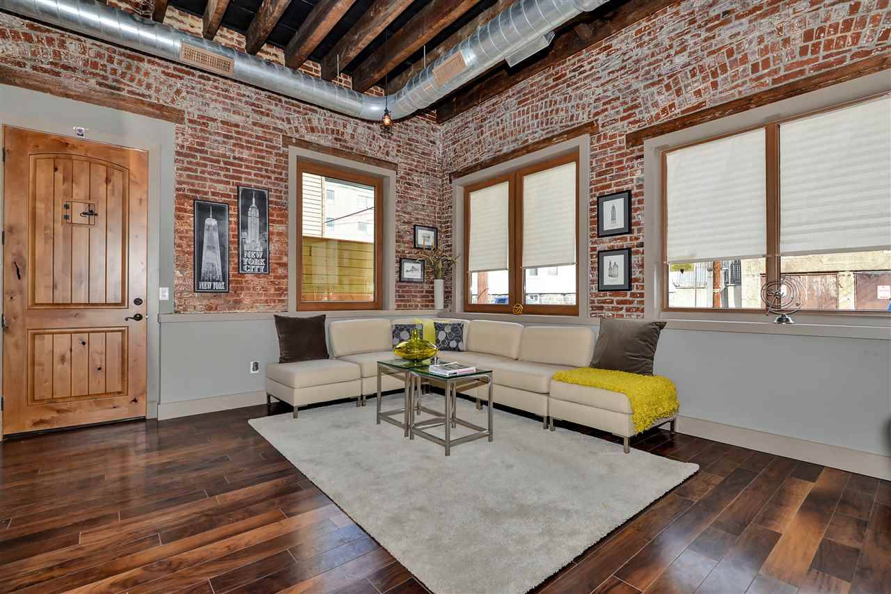 A higher standard of living for the cosmopolitan lifestyle in this 3 SOHO Lofts condo conversion