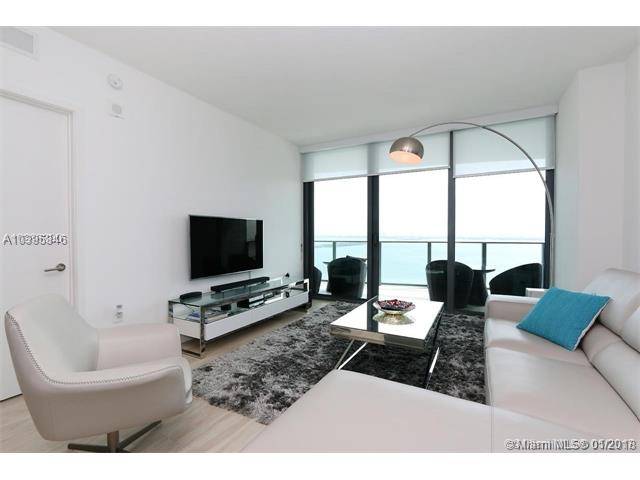 Brand new unit with unobstructed direct views of Biscayne Bay and Miami Beach