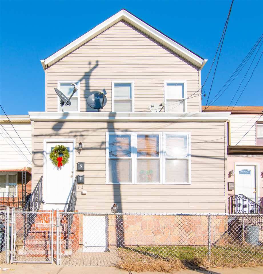 Excellent Renovated 2 Family investment property on a quiet block surrounded by many new construction properties