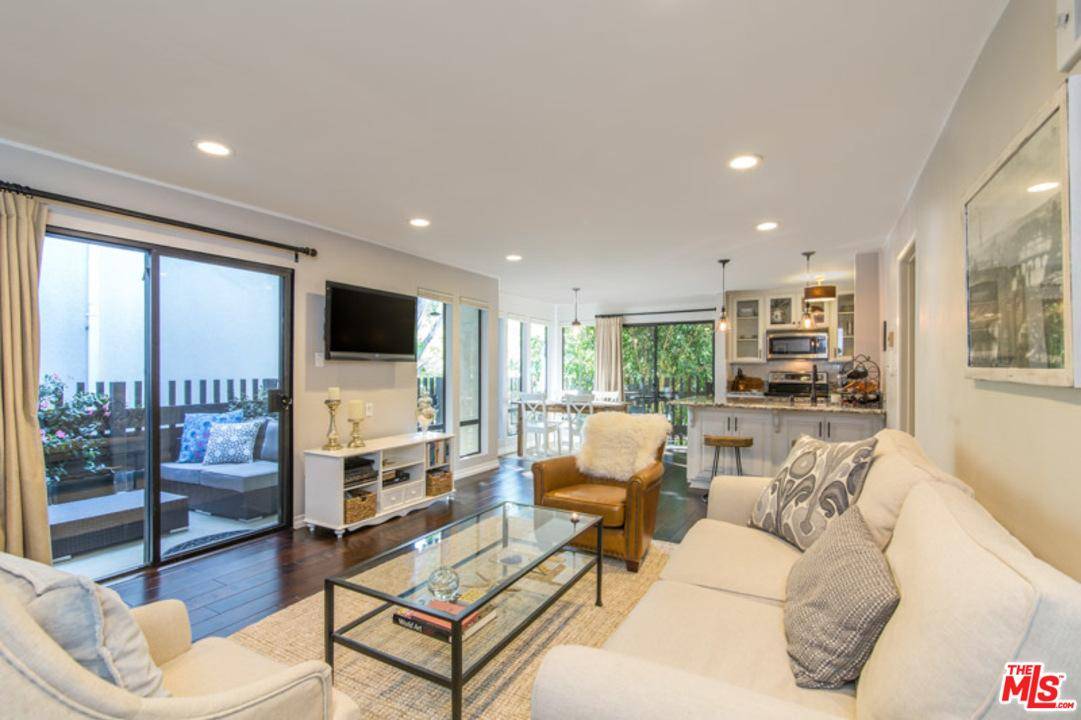 This impeccably updated 2BR/2BA condo is the epitome of Brentwood living