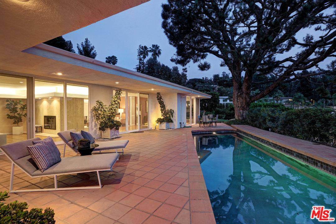 *REDUCED* Swanky 1960's Modern Home with walls of glass surrounded by pool