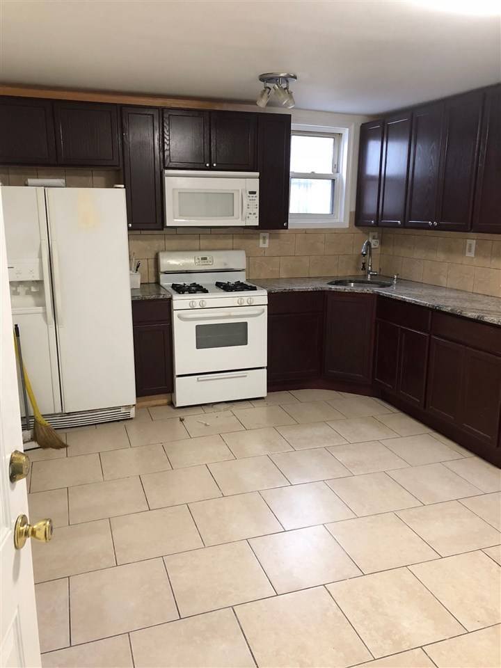 Great Jersey City location with hardwood floors throughout
